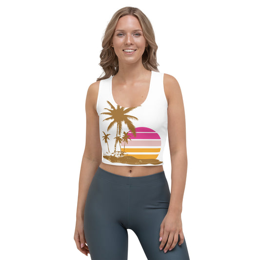 Woman with white crop top and a picture of brown palm trees and a pink sunset