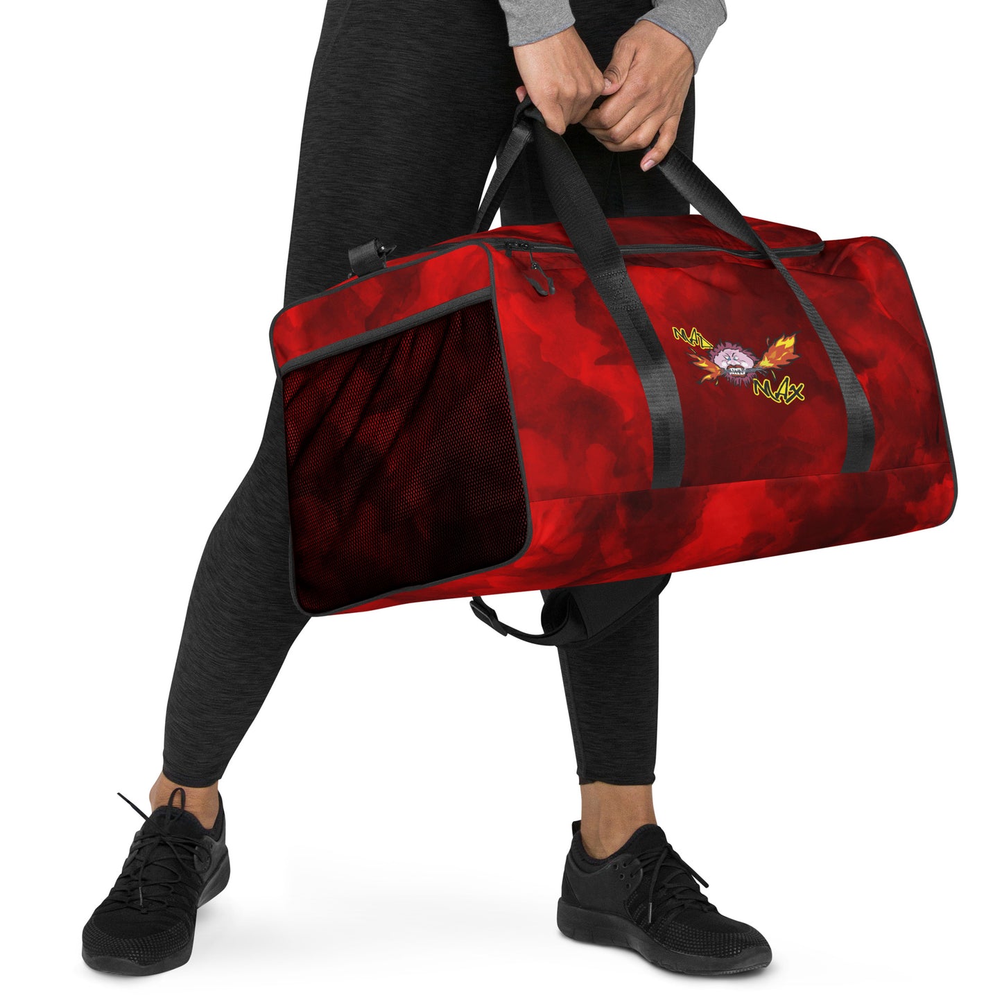 Woman with Red duffle bag with MAD MAX logo