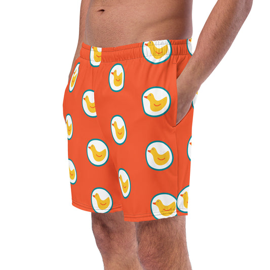 Men with Orange swim trunks with print of ducks