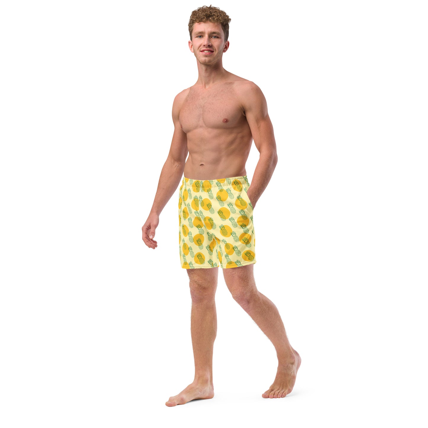 Men with yellow swim trunk and print of pineapples on it