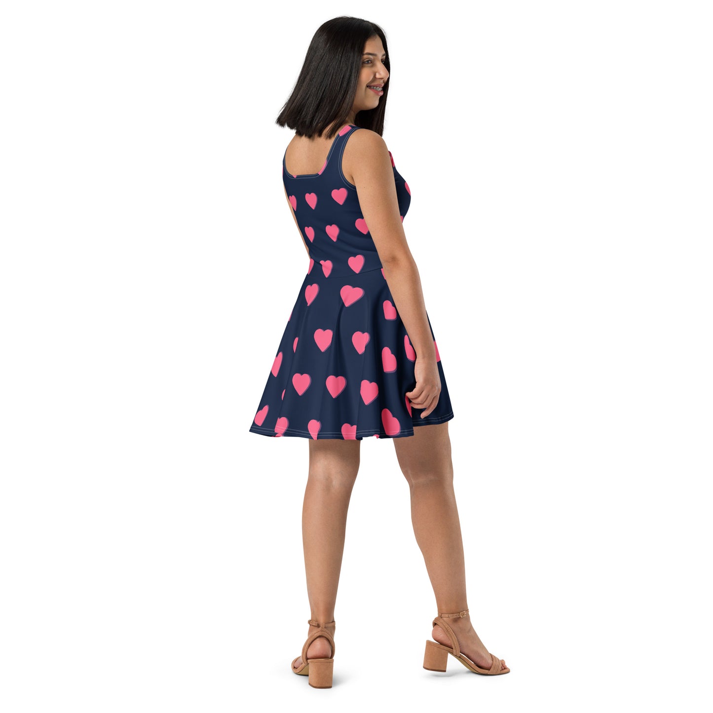 Woman with blue skater dress with hearts 