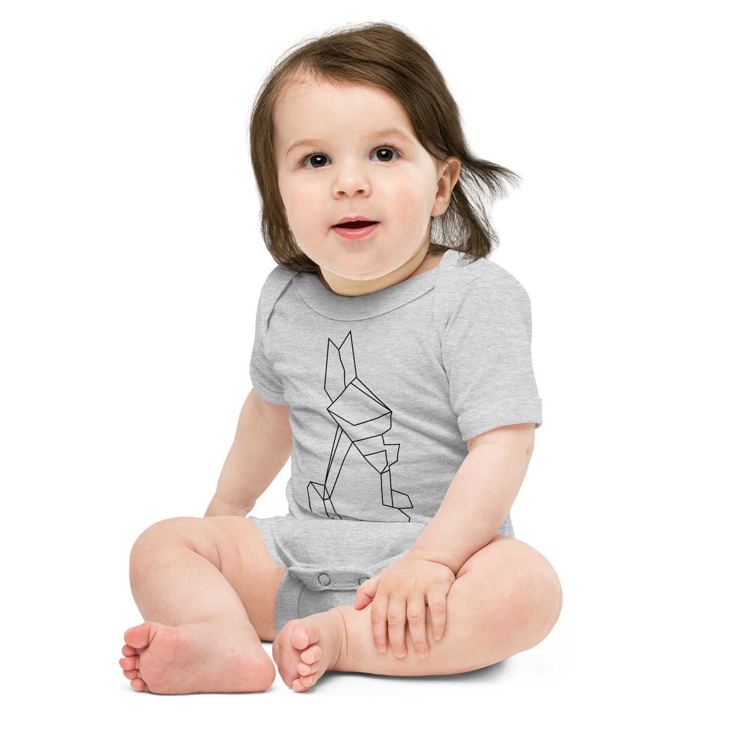 Baby with athletic body with a print of origami rabbit
