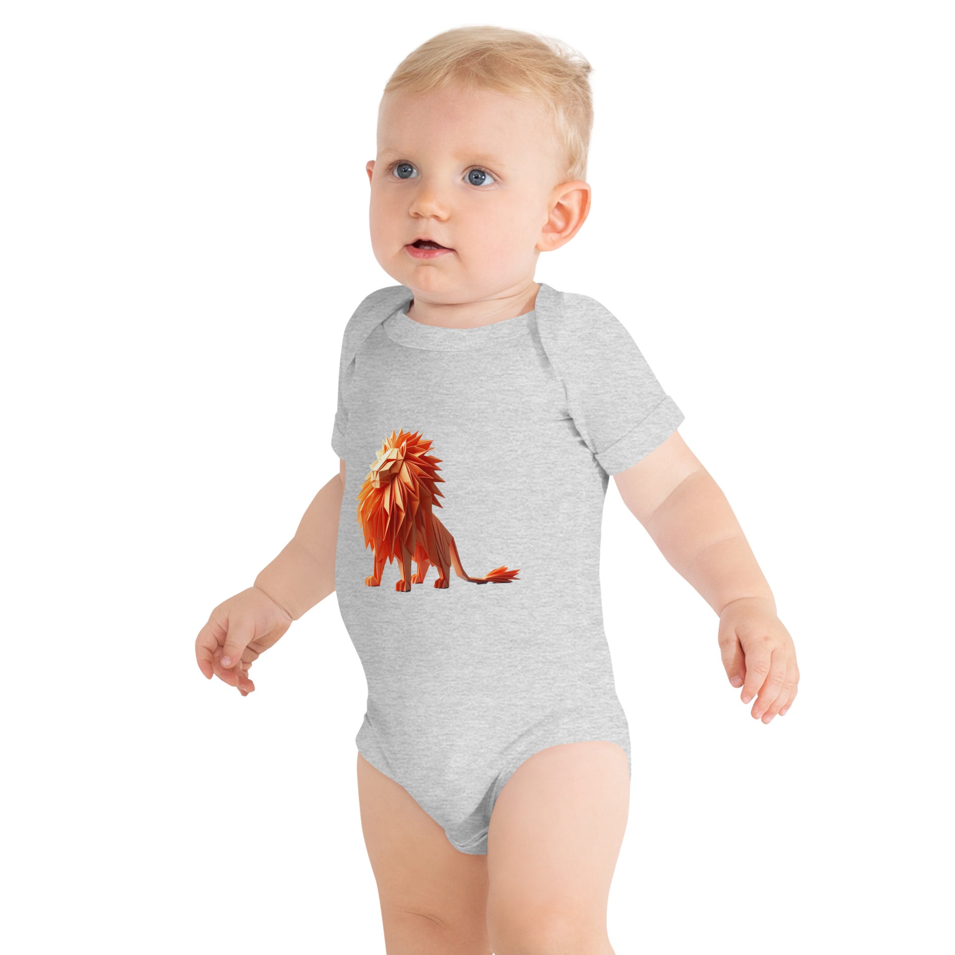 Baby with a grey bodysuit with a print of a lion