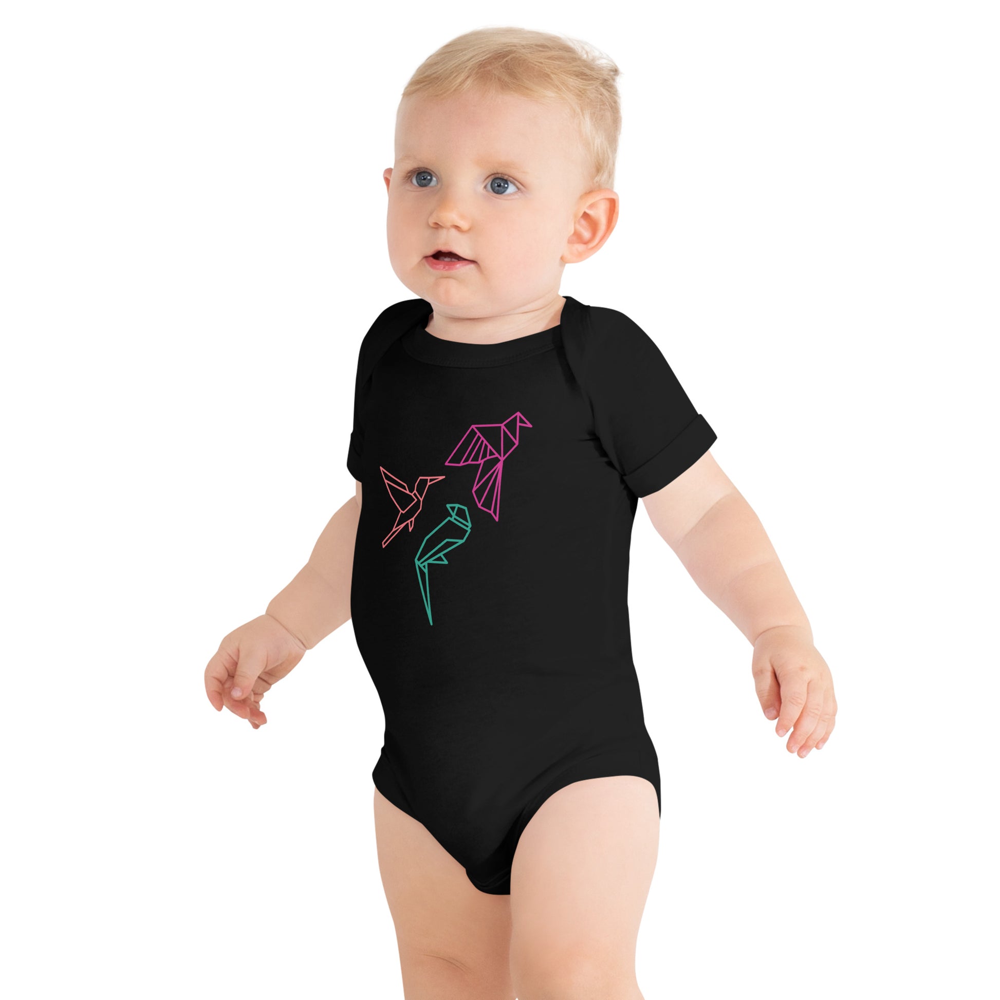 Baby with a black short sleeve one piece with three birds in Orange, Green and Pink