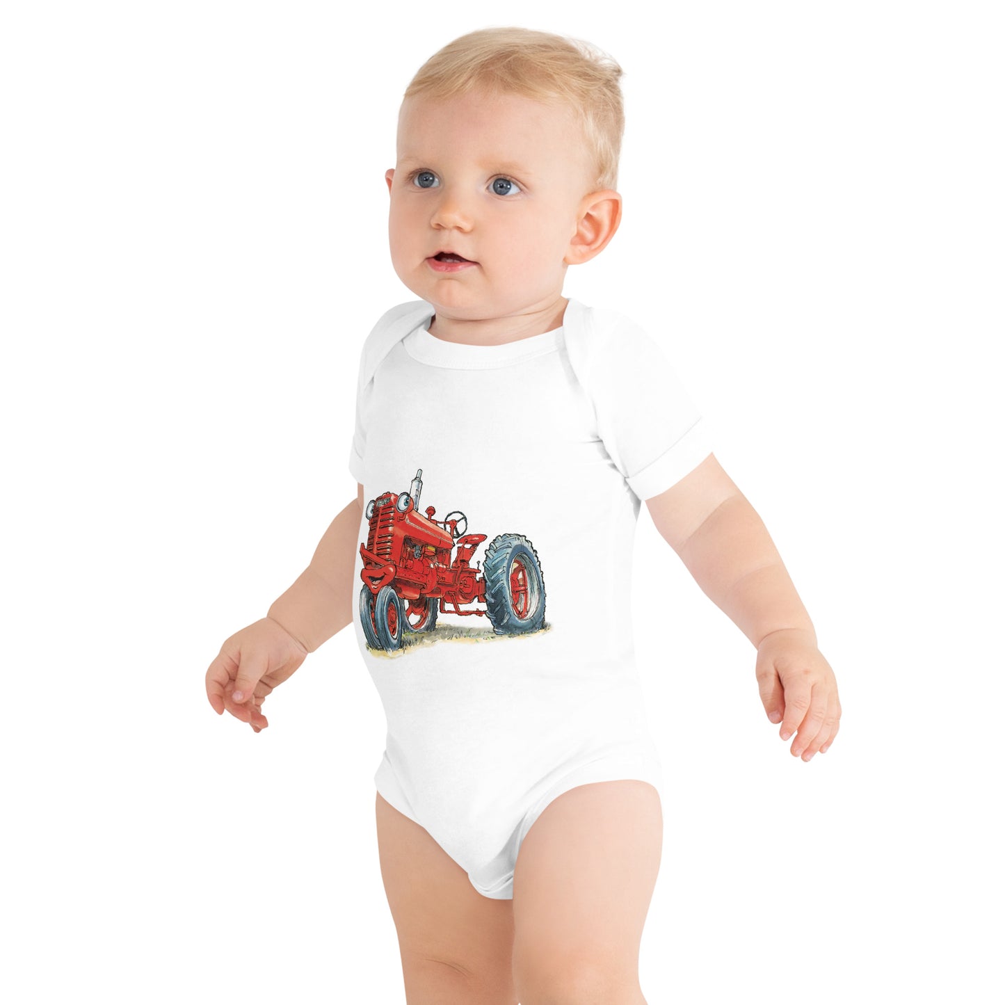 Baby with White body and a print of a red tractor