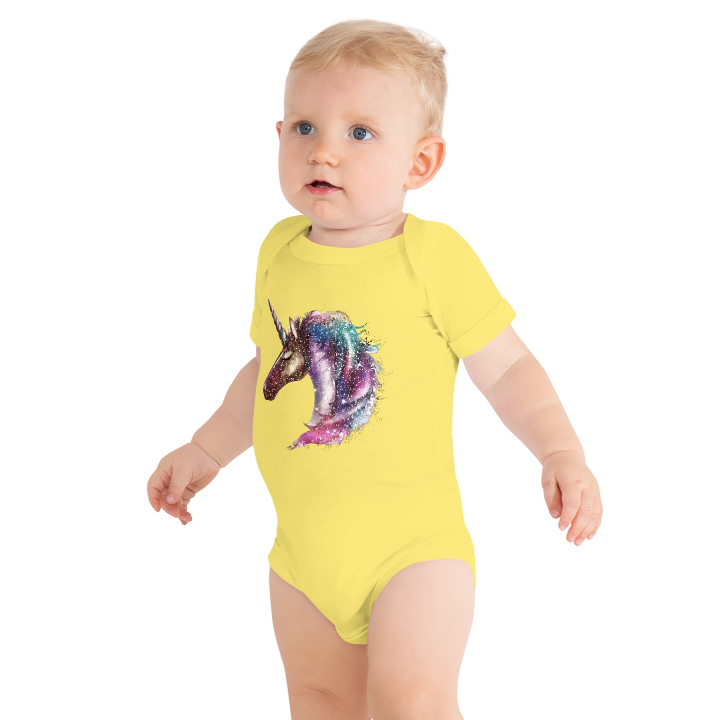 Baby with yellow body with print of a unicorn