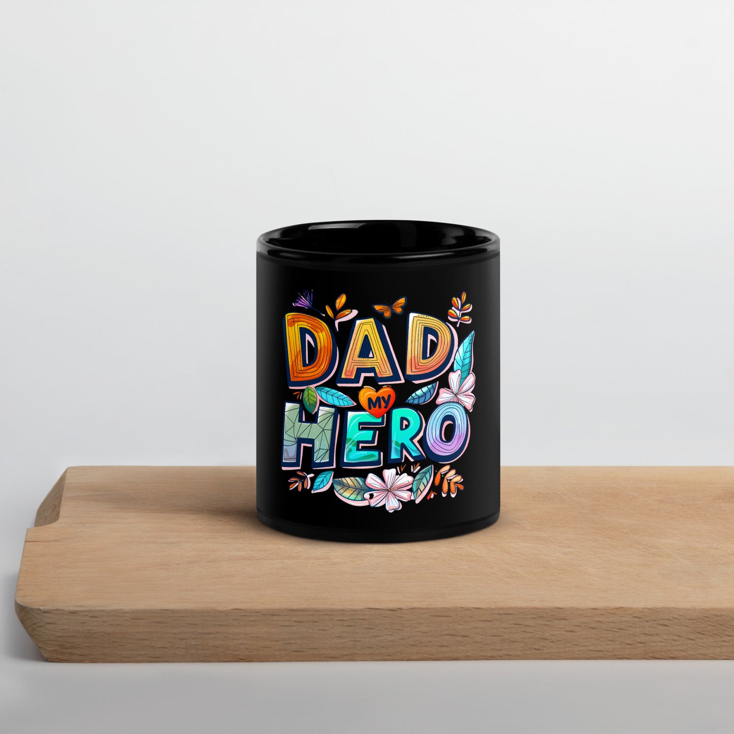 black glossy mug with text "Dad my Hero"