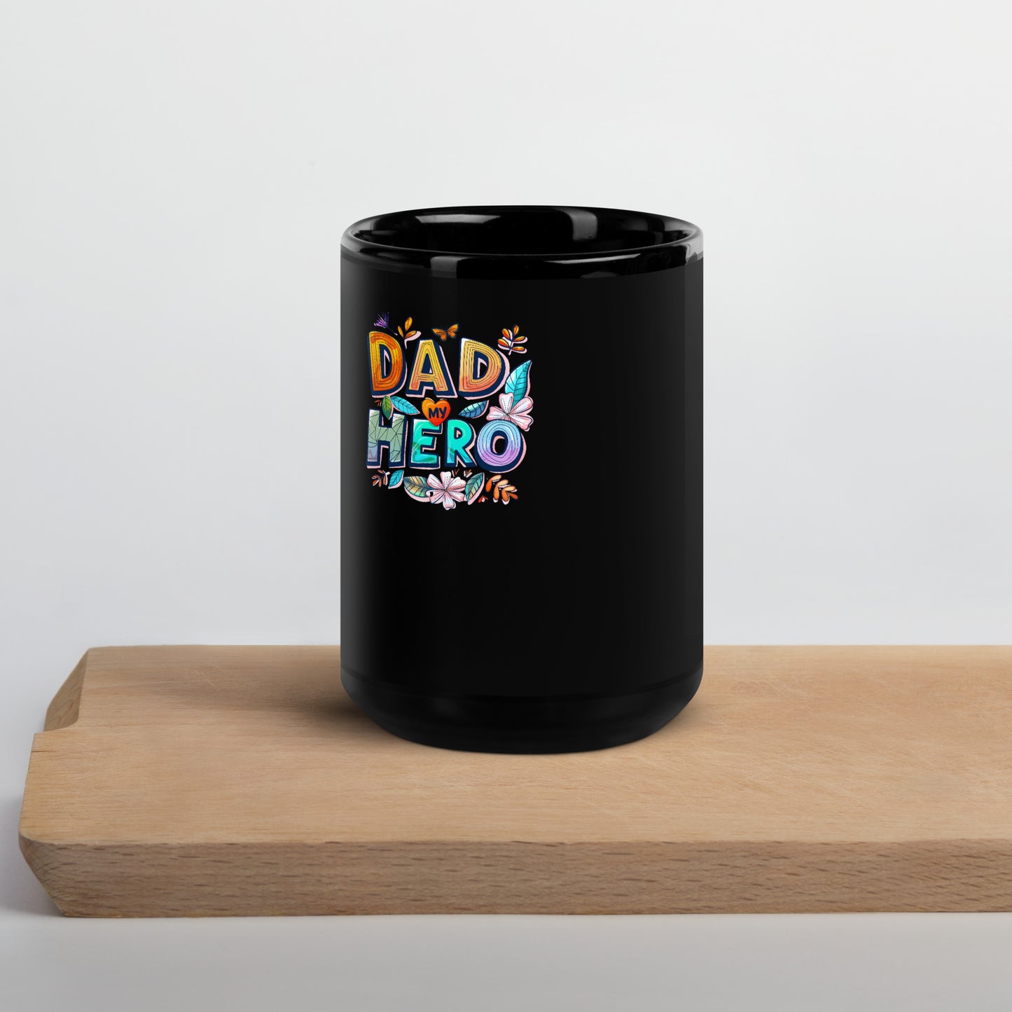 black glossy mug with text "Dad my Hero"