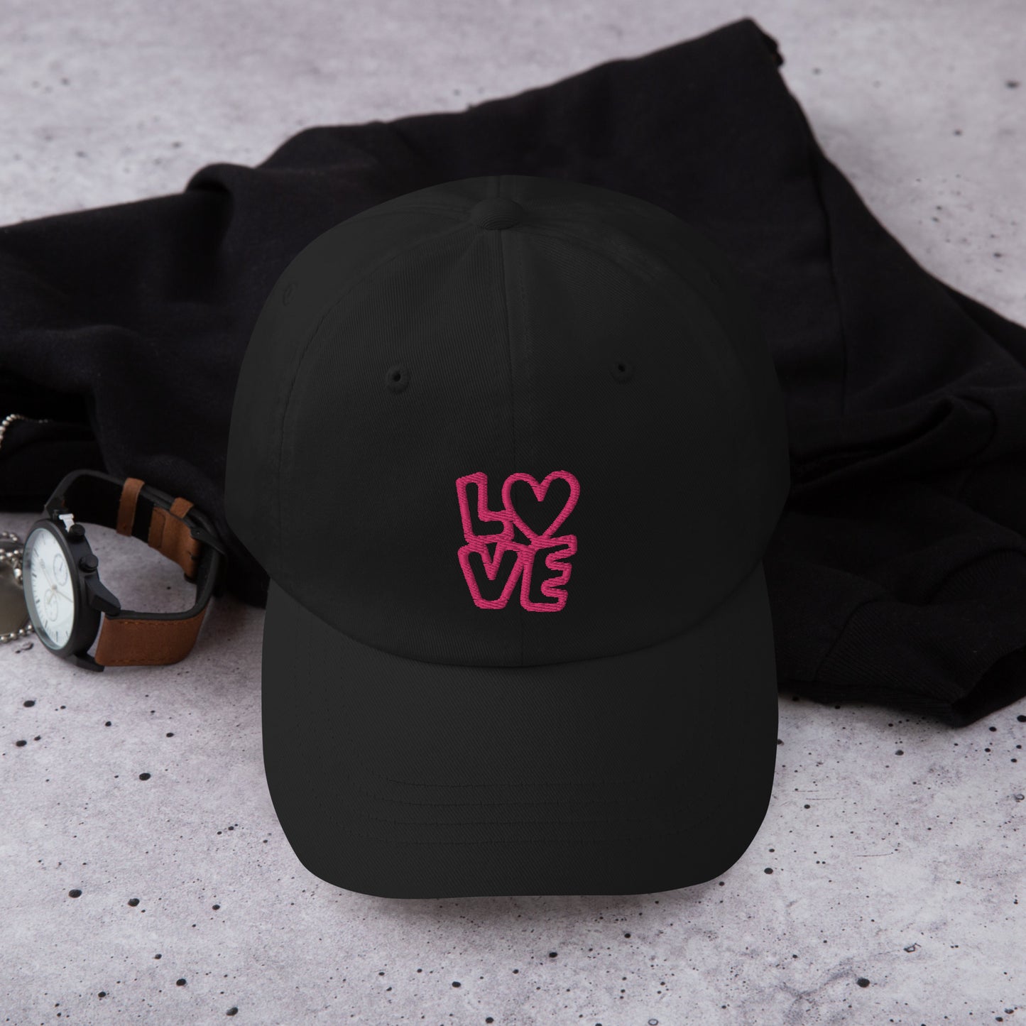 Black Hat with the pink letters LOVE with the O in heart shape