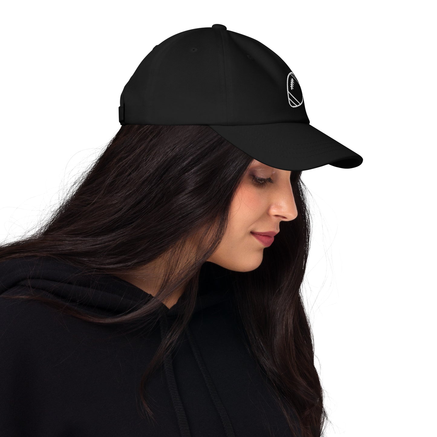 women with black baseball cap with football