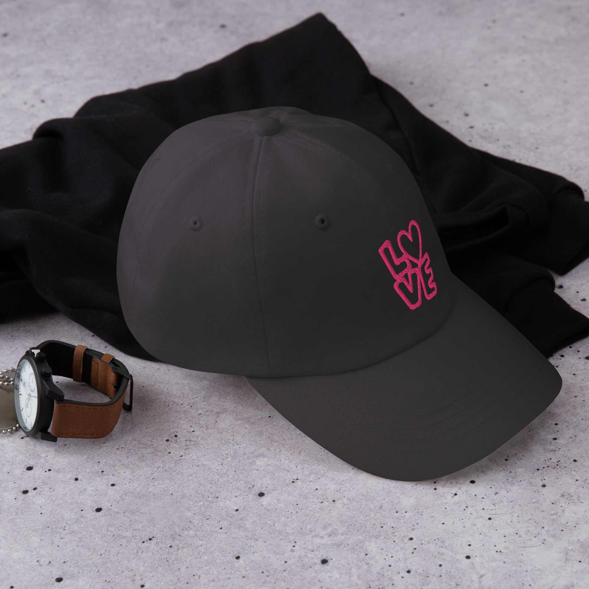 Dark grey Hat with the pink letters LOVE with the O in heart shape