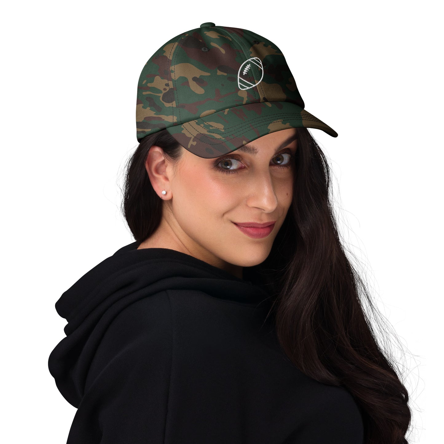 women with green camo baseball cap with football