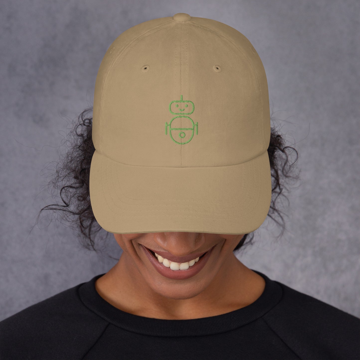 Women with khaki hat with in green Android logo