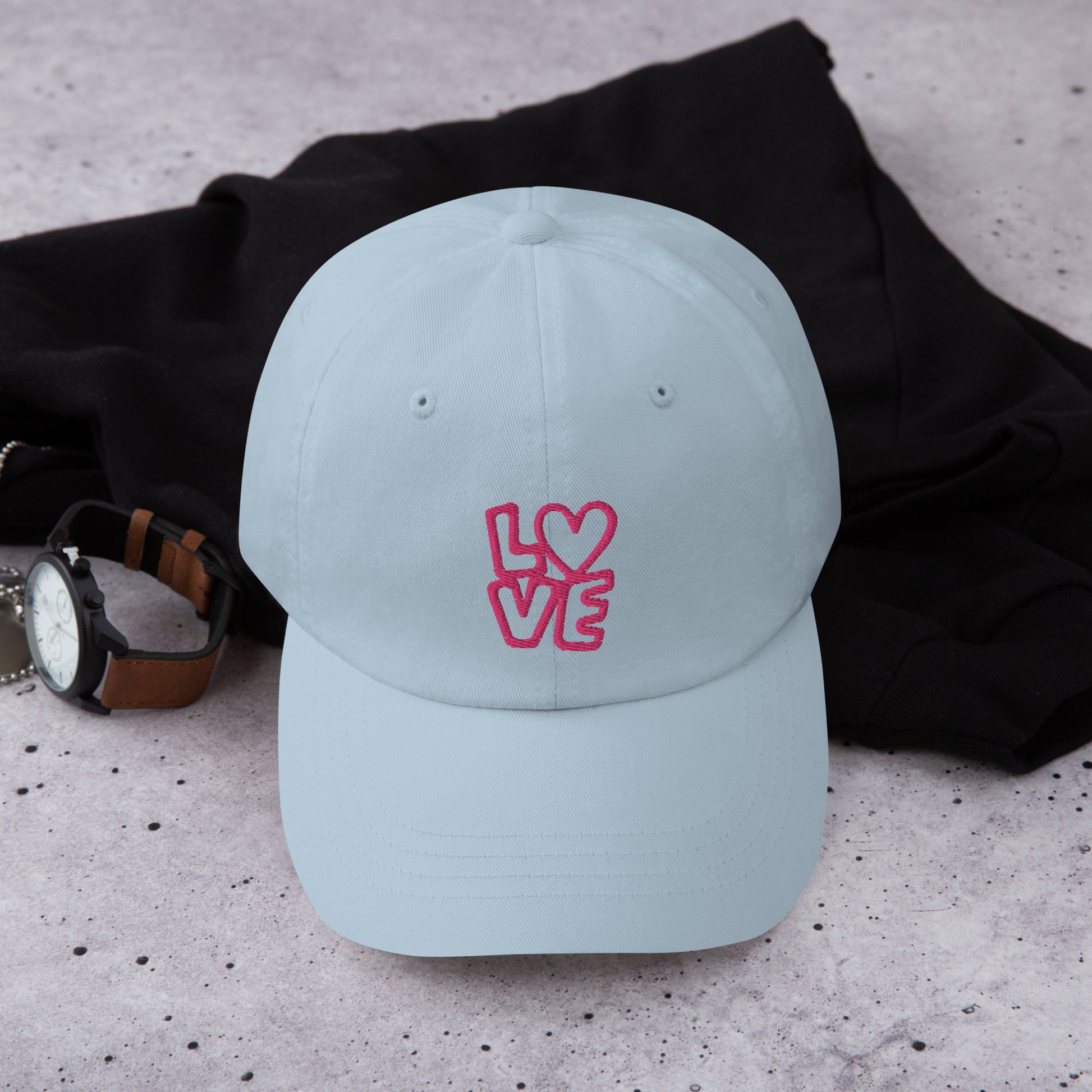 Light blue Hat with the pink letters LOVE with the O in heart shape