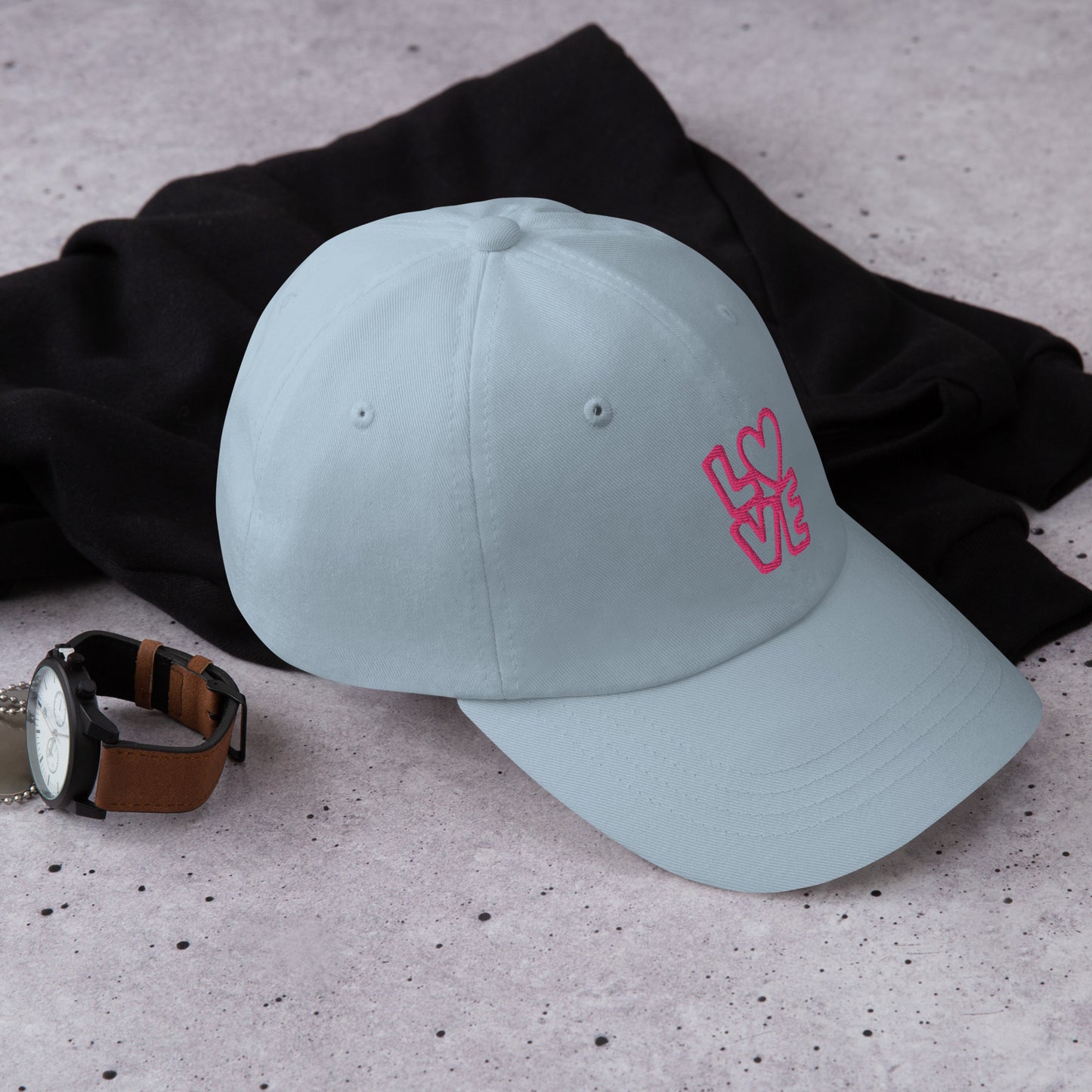Light blue Hat with the pink letters LOVE with the O in heart shape