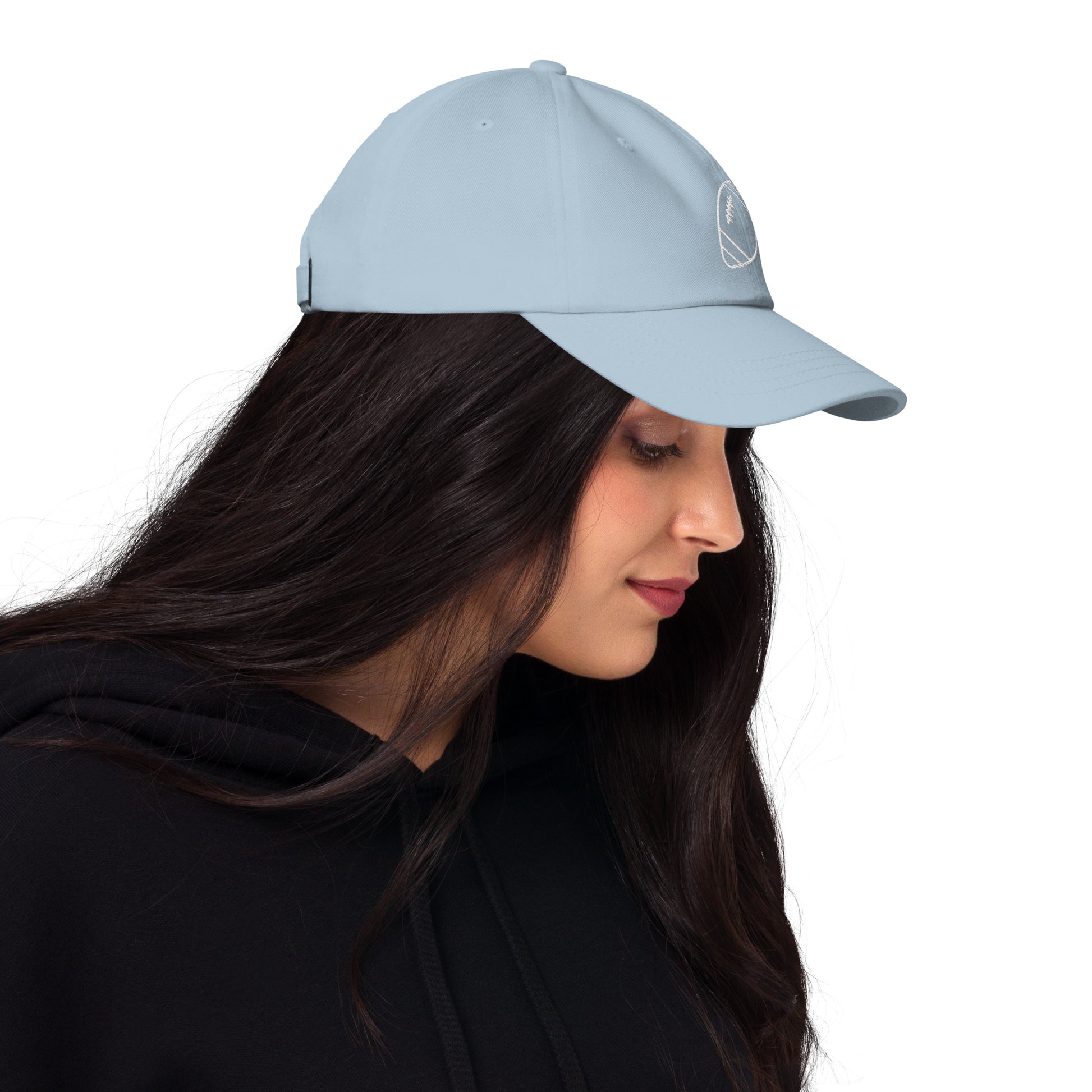 women with light blue baseball cap with football