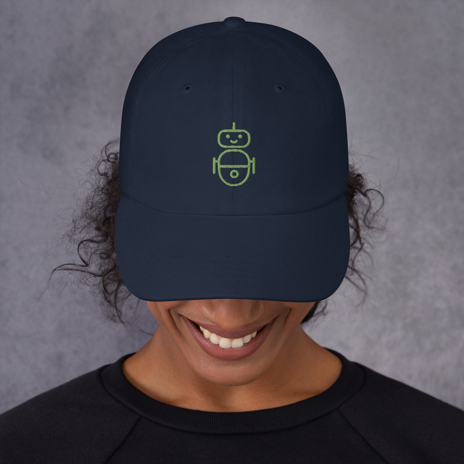 Women with navy hat with in green Android logo