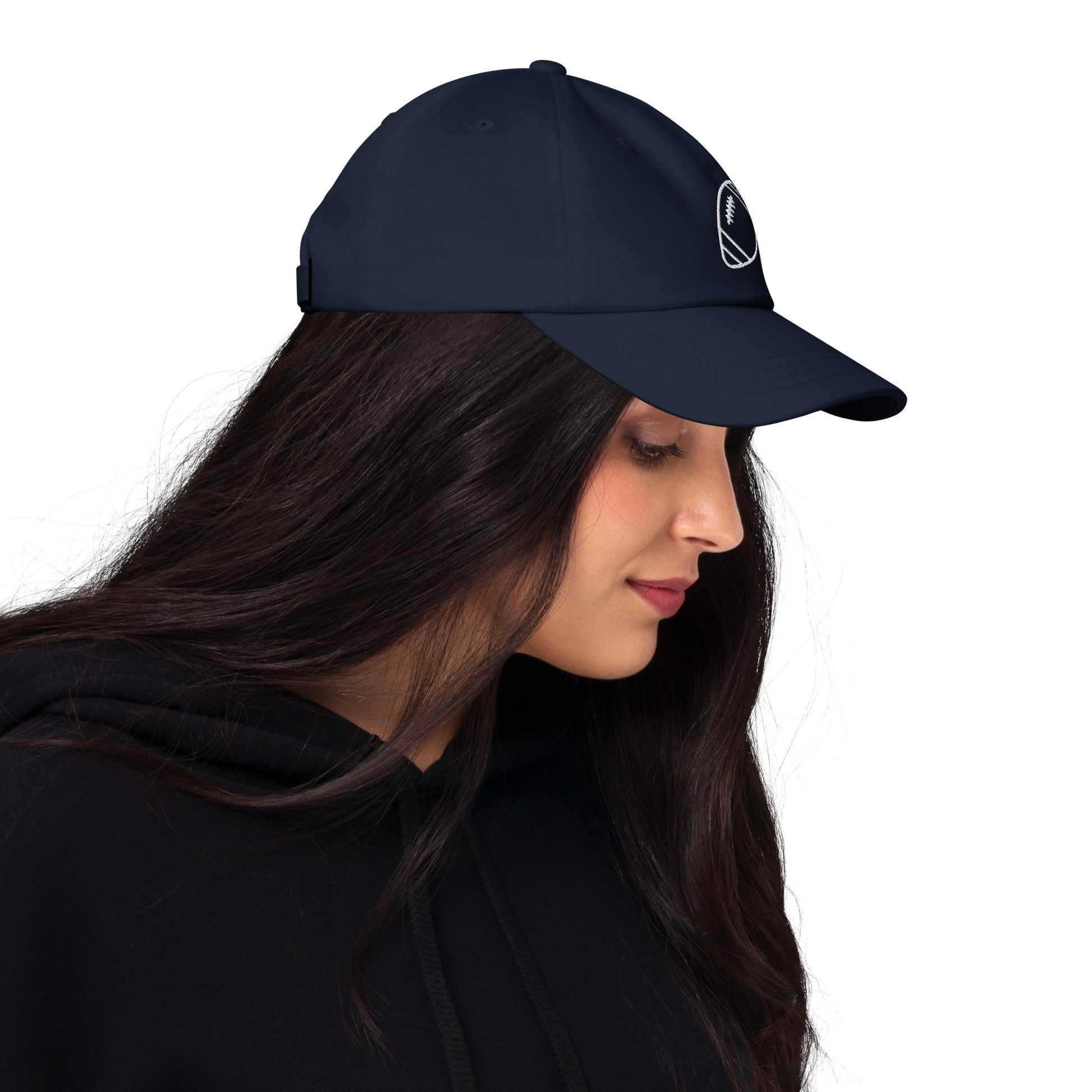 women with navy baseball cap with football