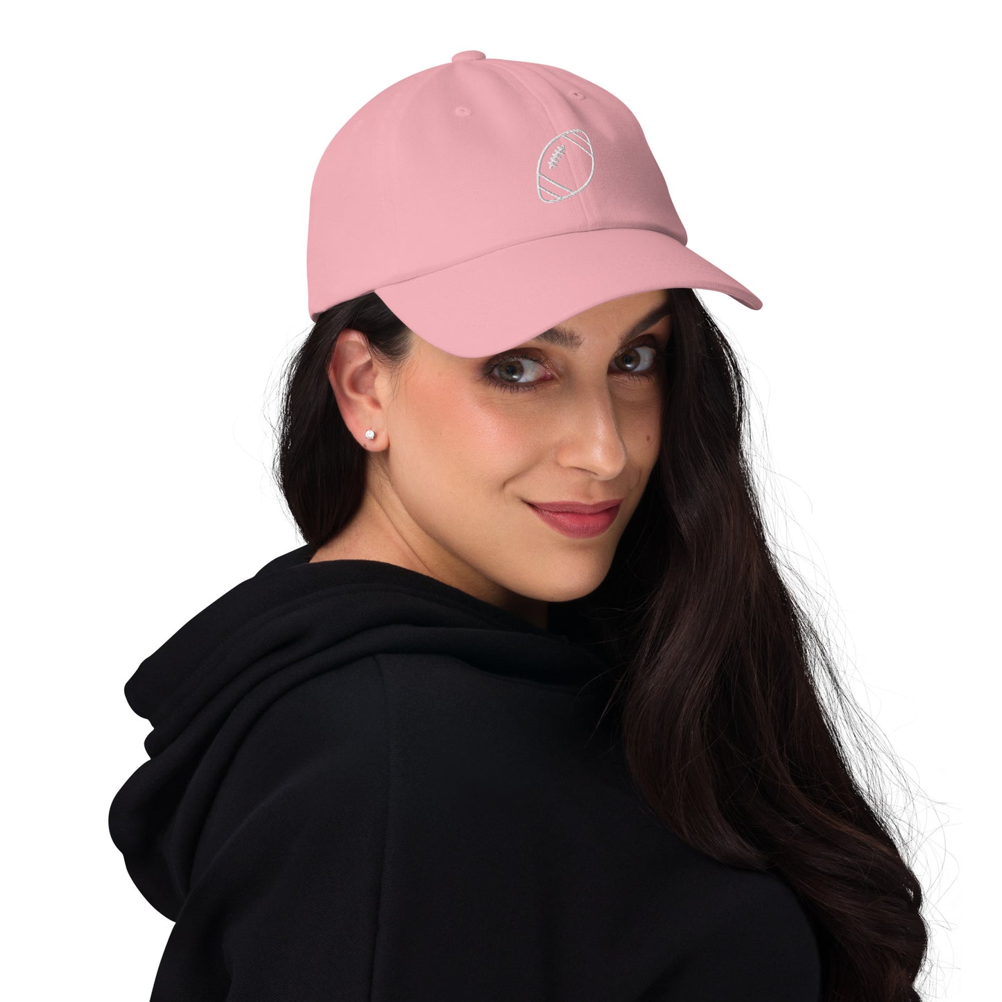 women with pink baseball cap with football