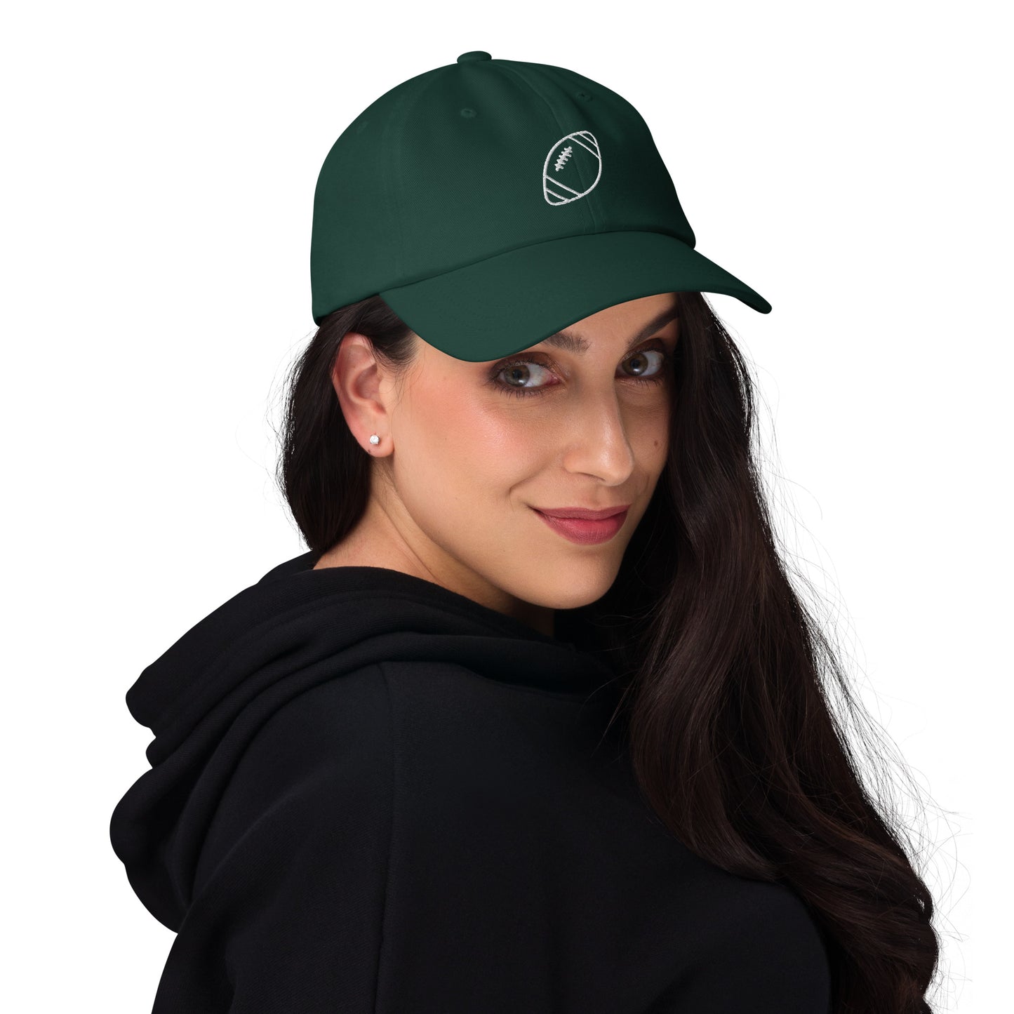 women with green baseball cap with football