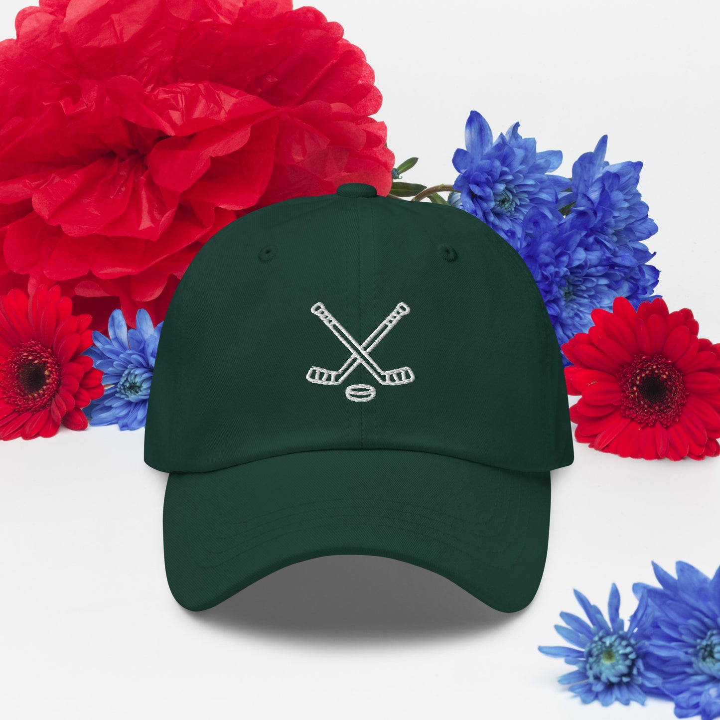 Spruce green hat with print of hockeysticks and puk