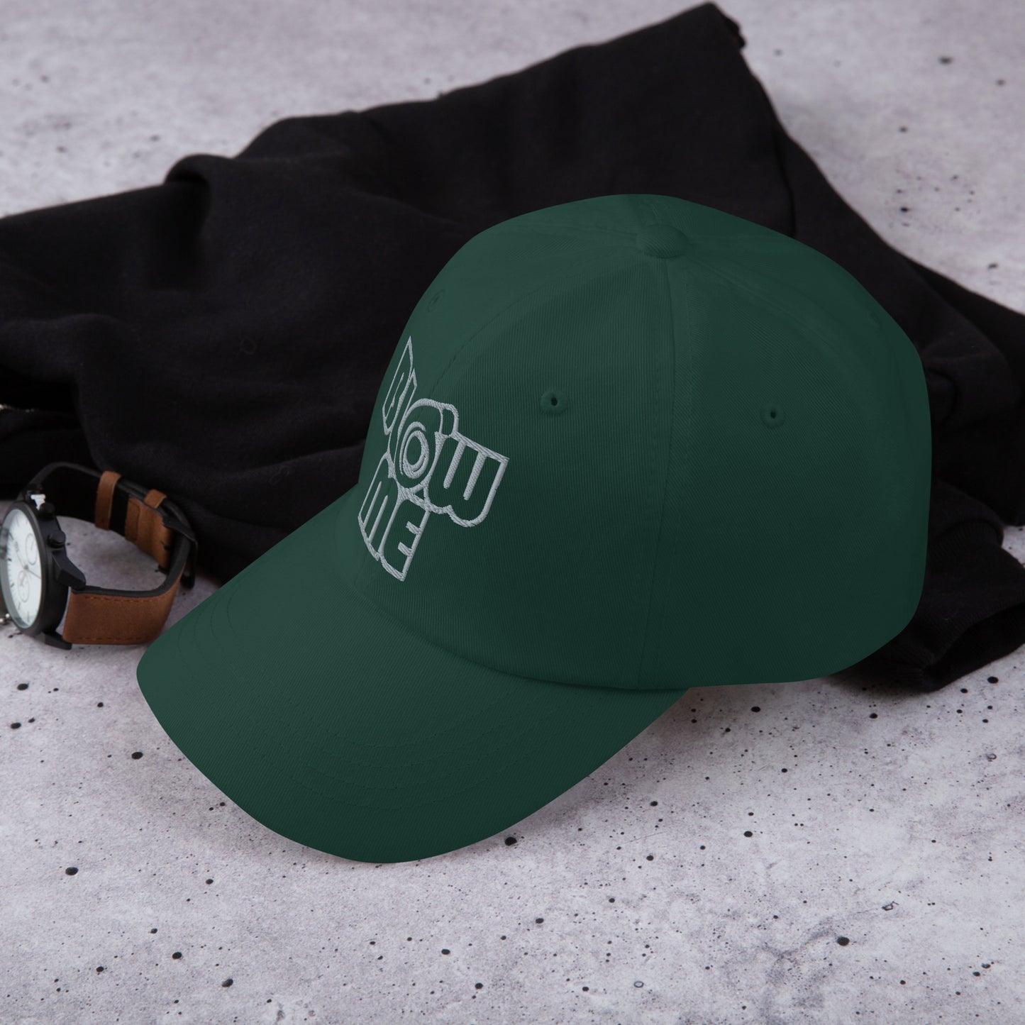Spruce green hat with the text Blow me, turbo compressor