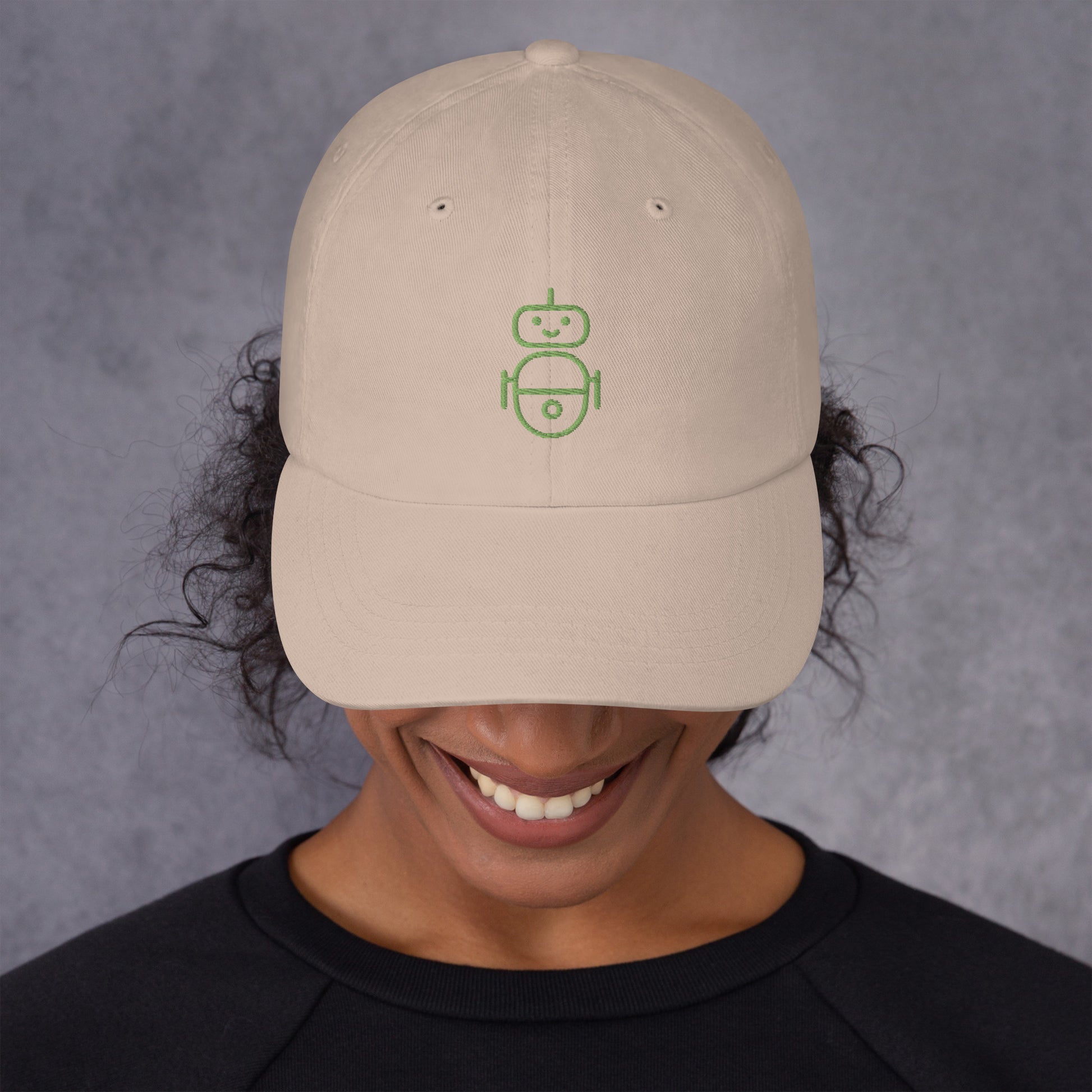 Women with stone hat with in green Android logo