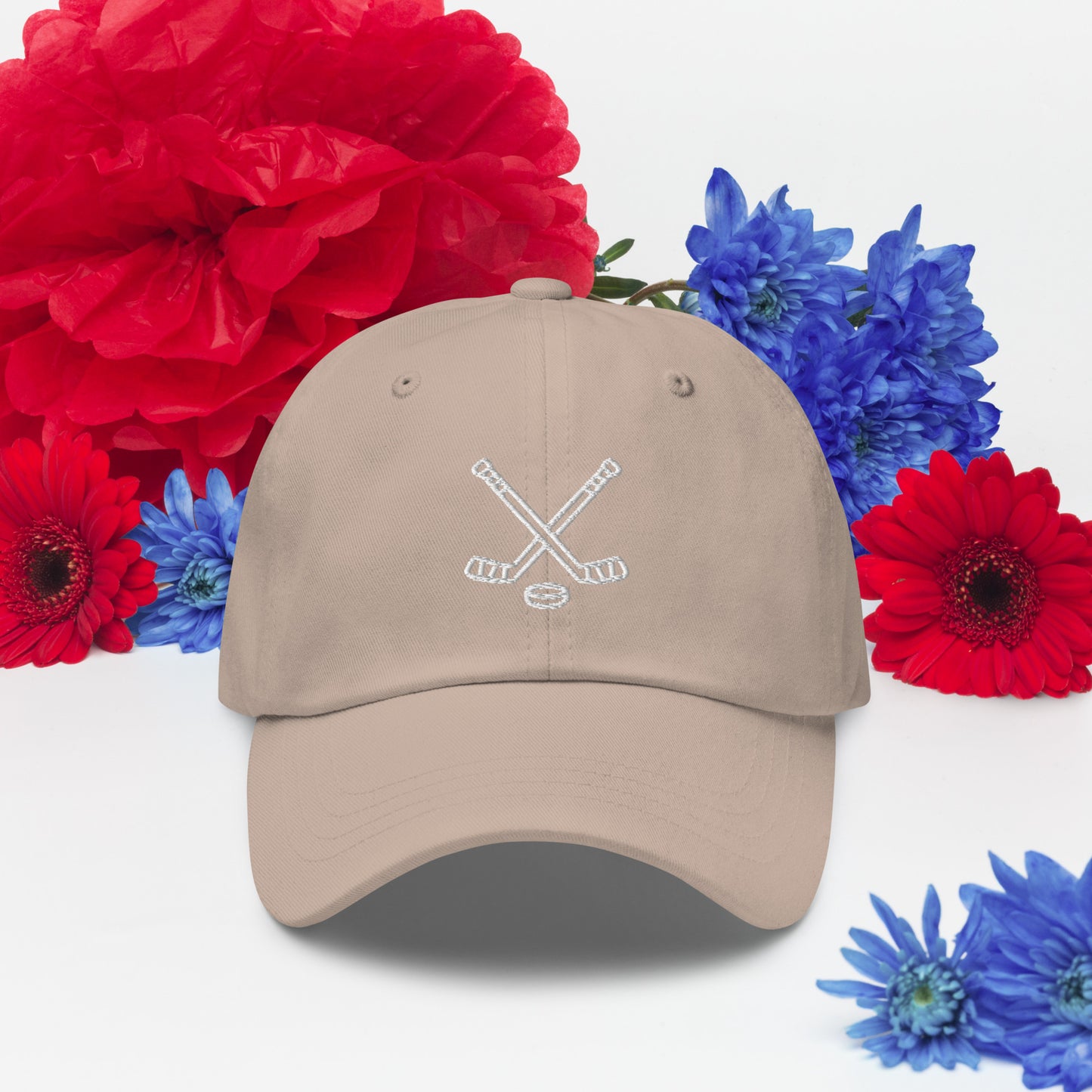 Stone hat with print of hockeysticks and puck