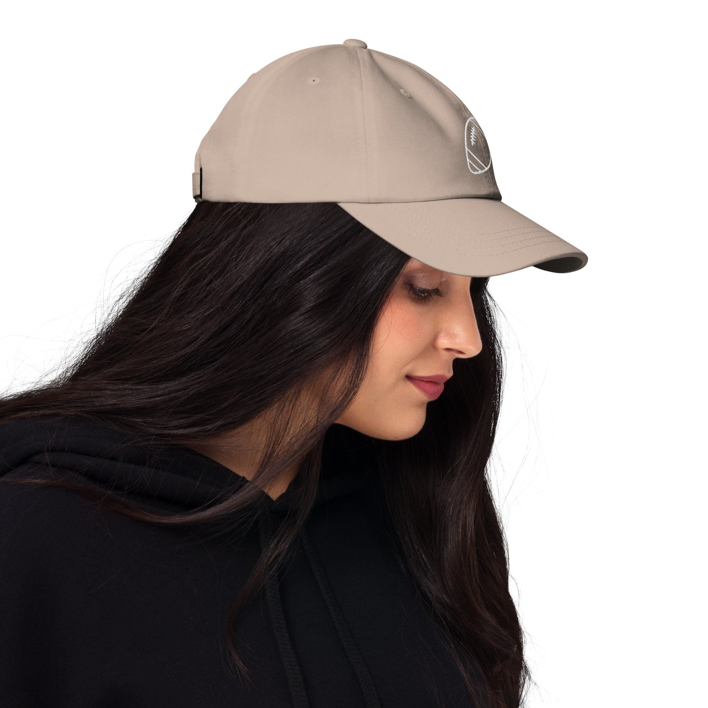 women with stone baseball cap with football
