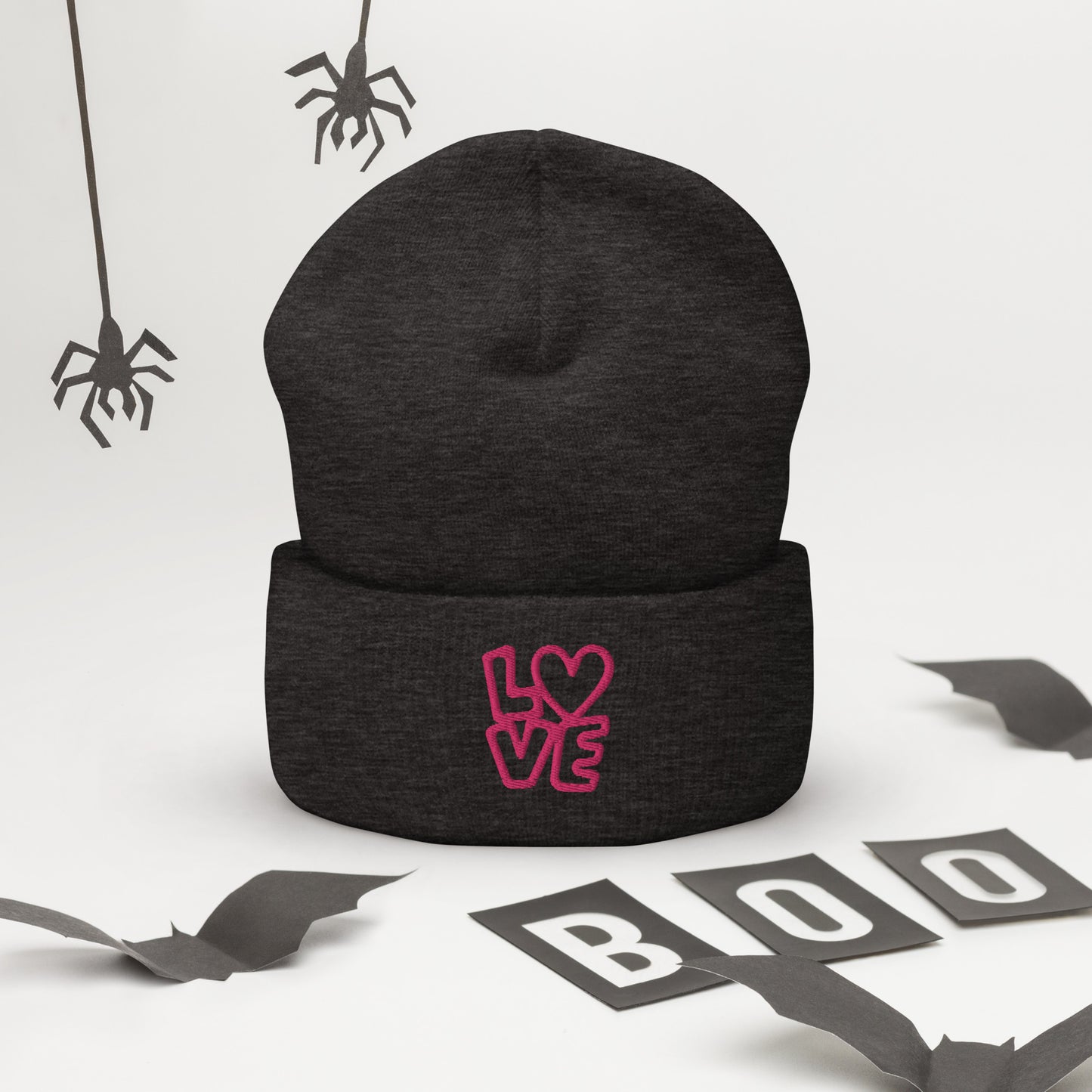 Dark grey beanie with the pink letters LOVE with the O in heart shape
