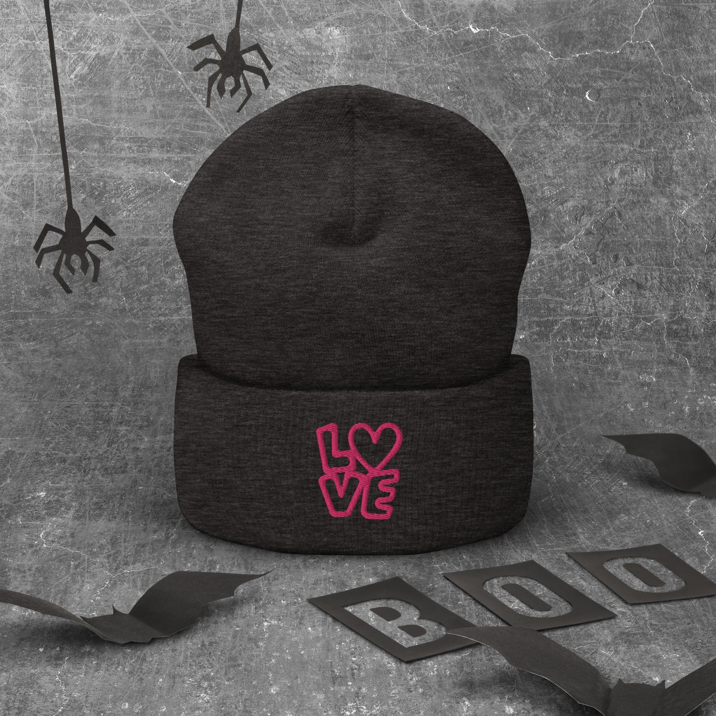 Dark grey beanie with the pink letters LOVE with the O in heart shape
