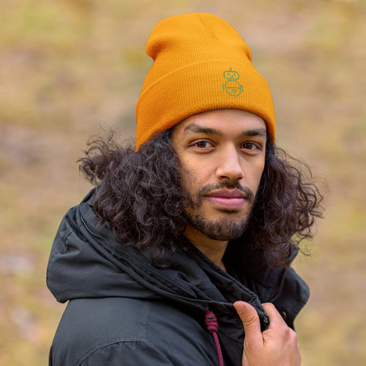Men with gold beanie and Android logo in green