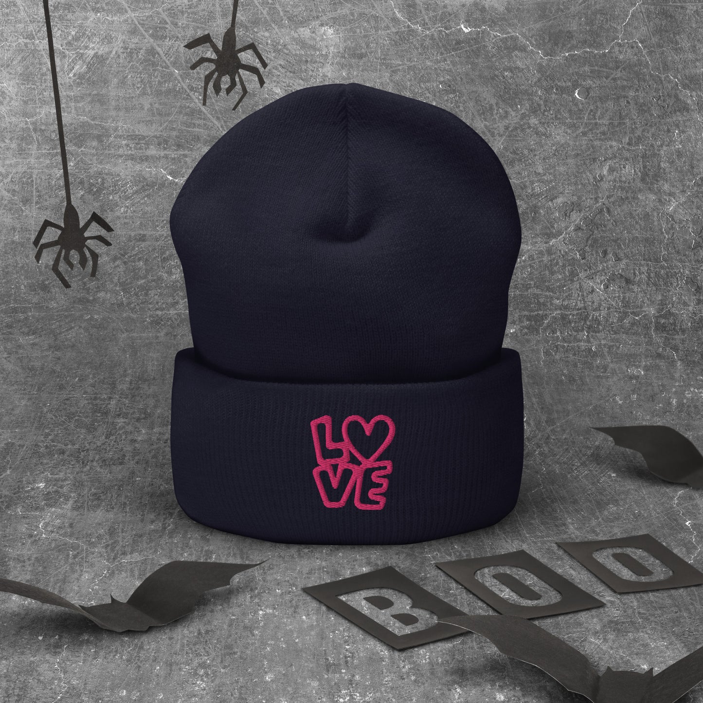Navy beanie with the pink letters LOVE with the O in heart shape