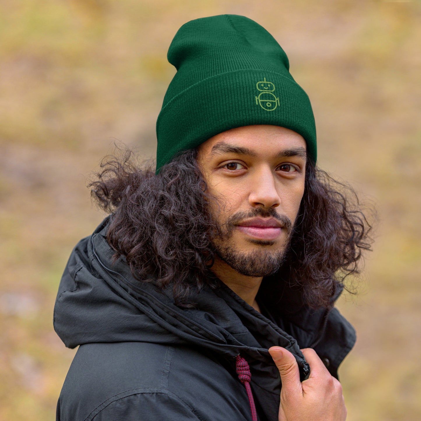 Men with green beanie and Android logo in green