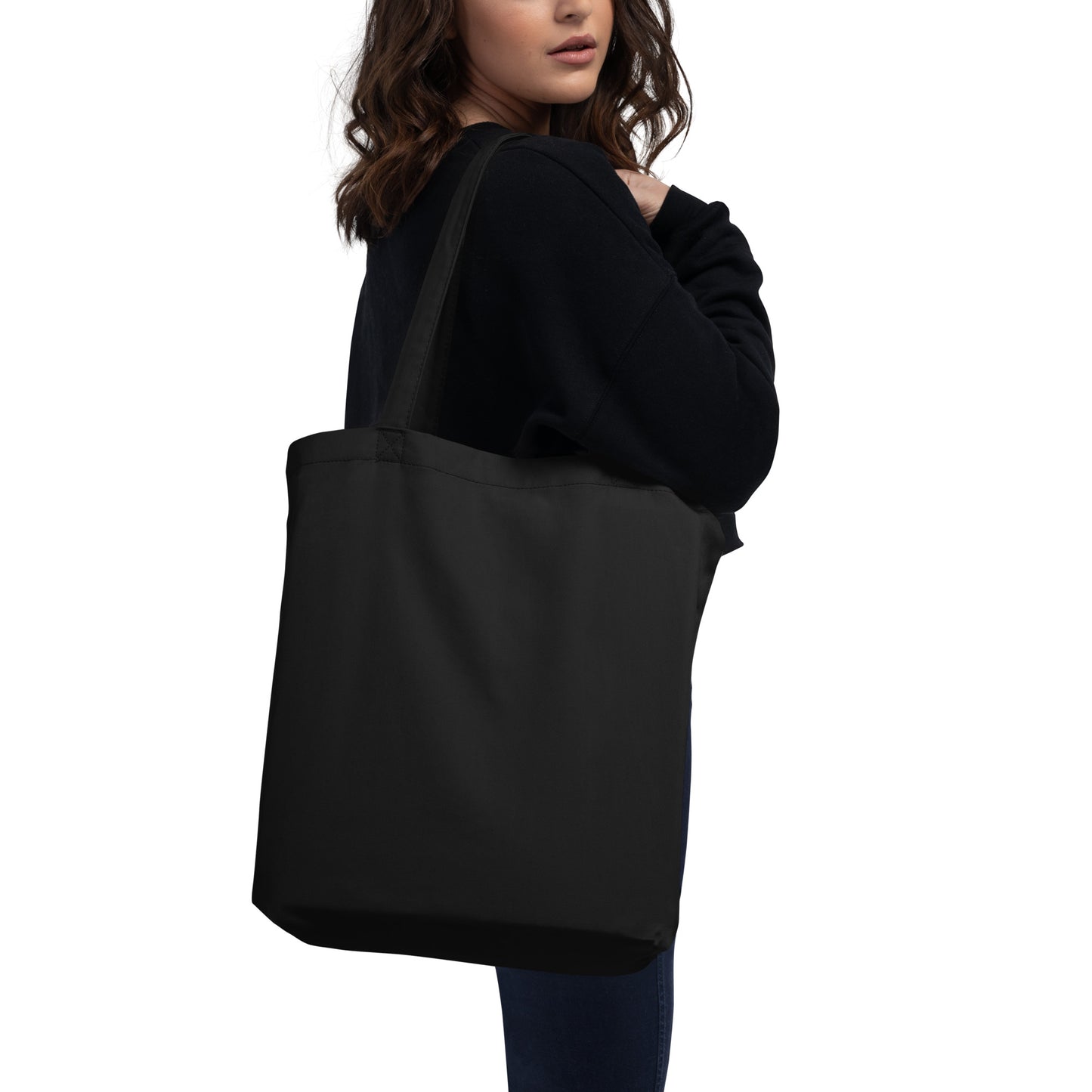 Woman with black tote bag with picture of esc key