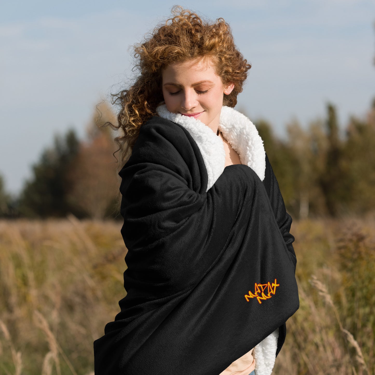 Black blanket with the text MAD MAX