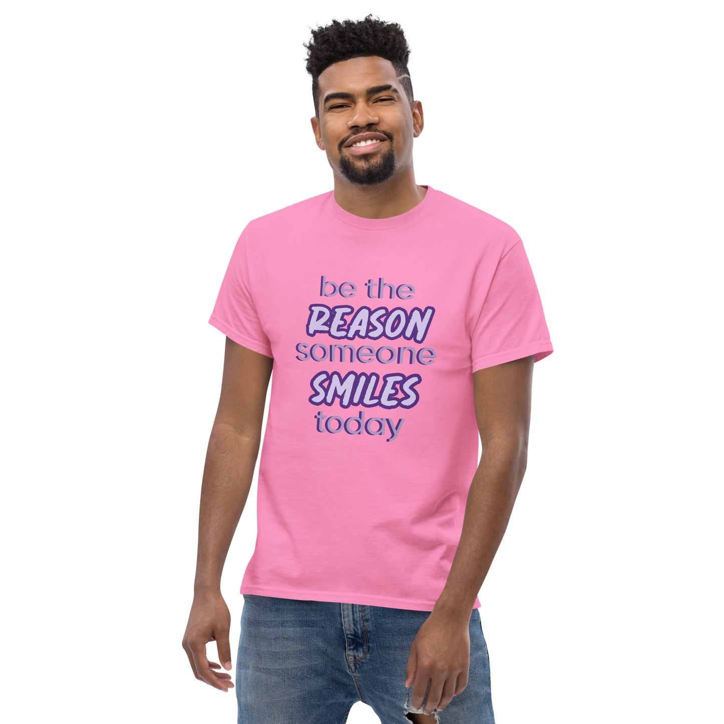 Men with azalea T-shirt and the quote "be the reason someone smiles today" in purple on it. 