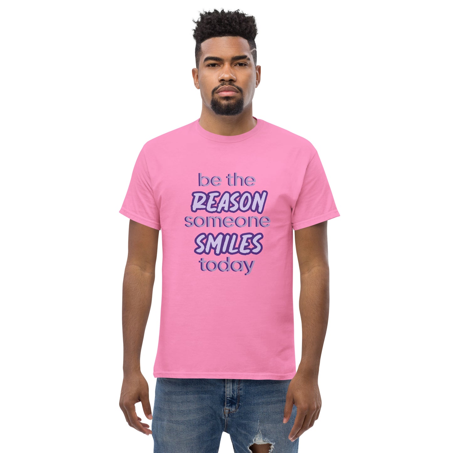 Men with azalea T-shirt and the quote "be the reason someone smiles today" in purple on it.