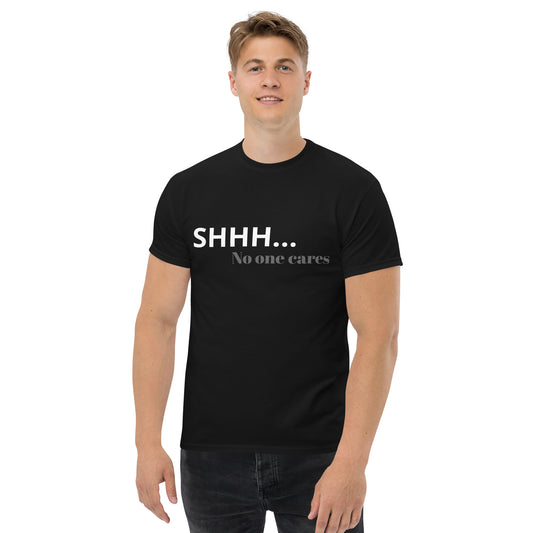 Men with black T-shirt with the text " SHHH... No one cares"