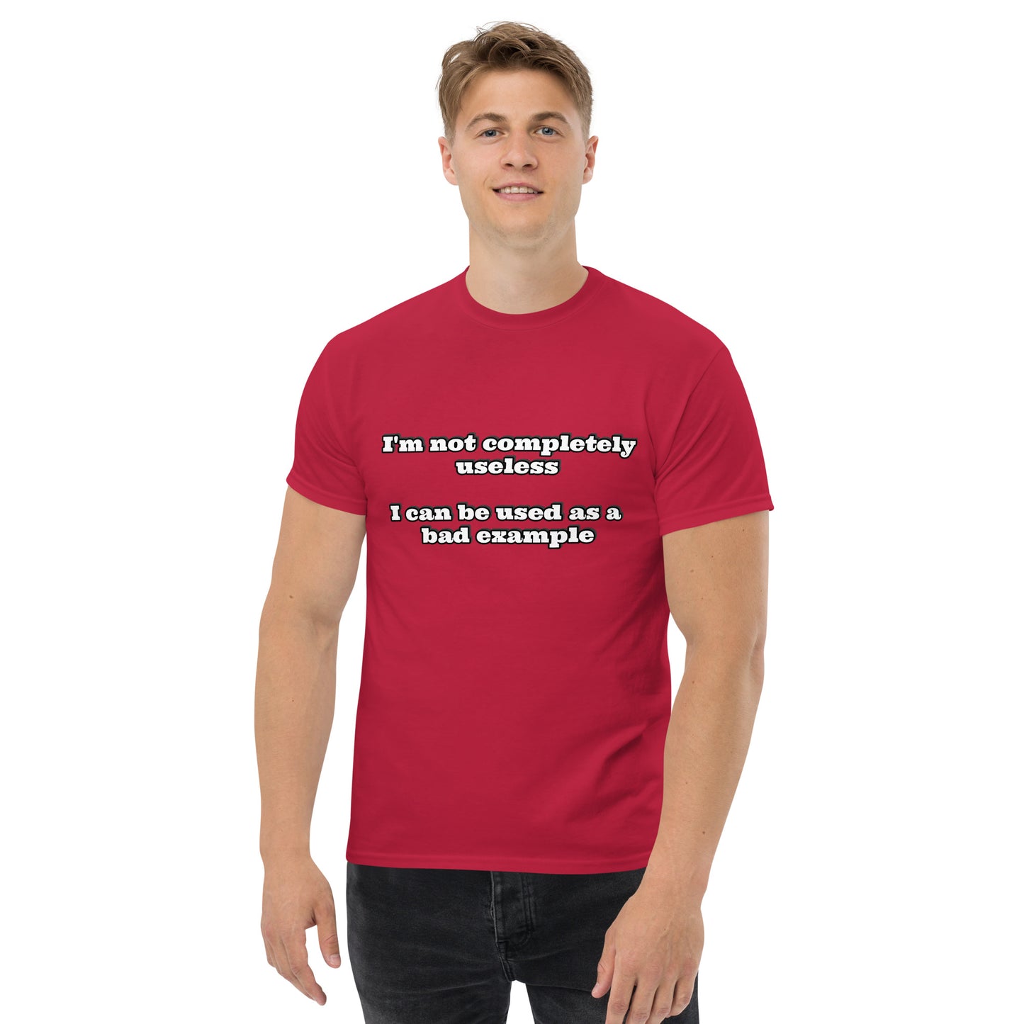 Men with cardinal red t-shirt with text “I'm not completely useless I can be used as a bad example”