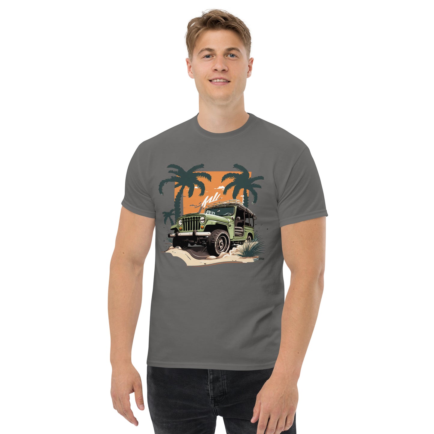 man with grey t-shirt with picture of jeep in front of palm trees 