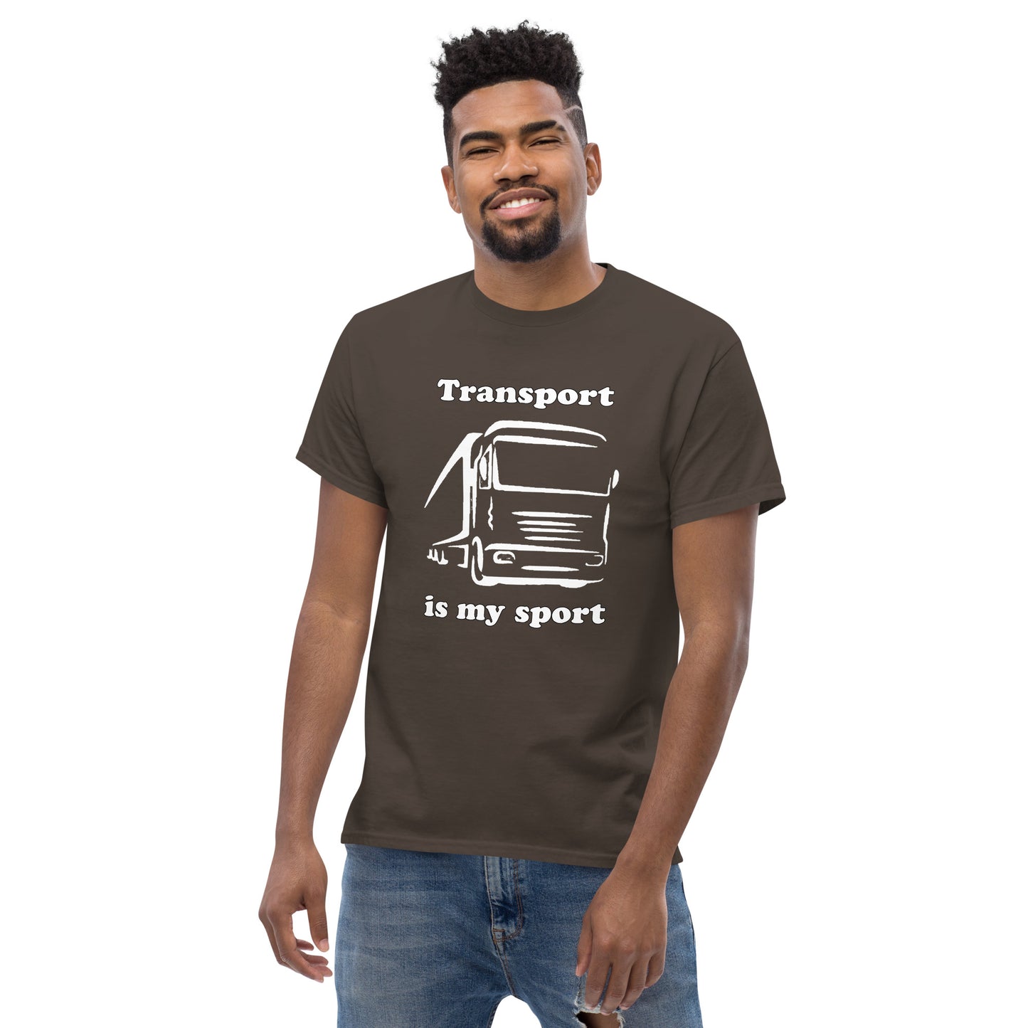 Man with brown t-shirt with picture of truck and text "Transport is my sport"