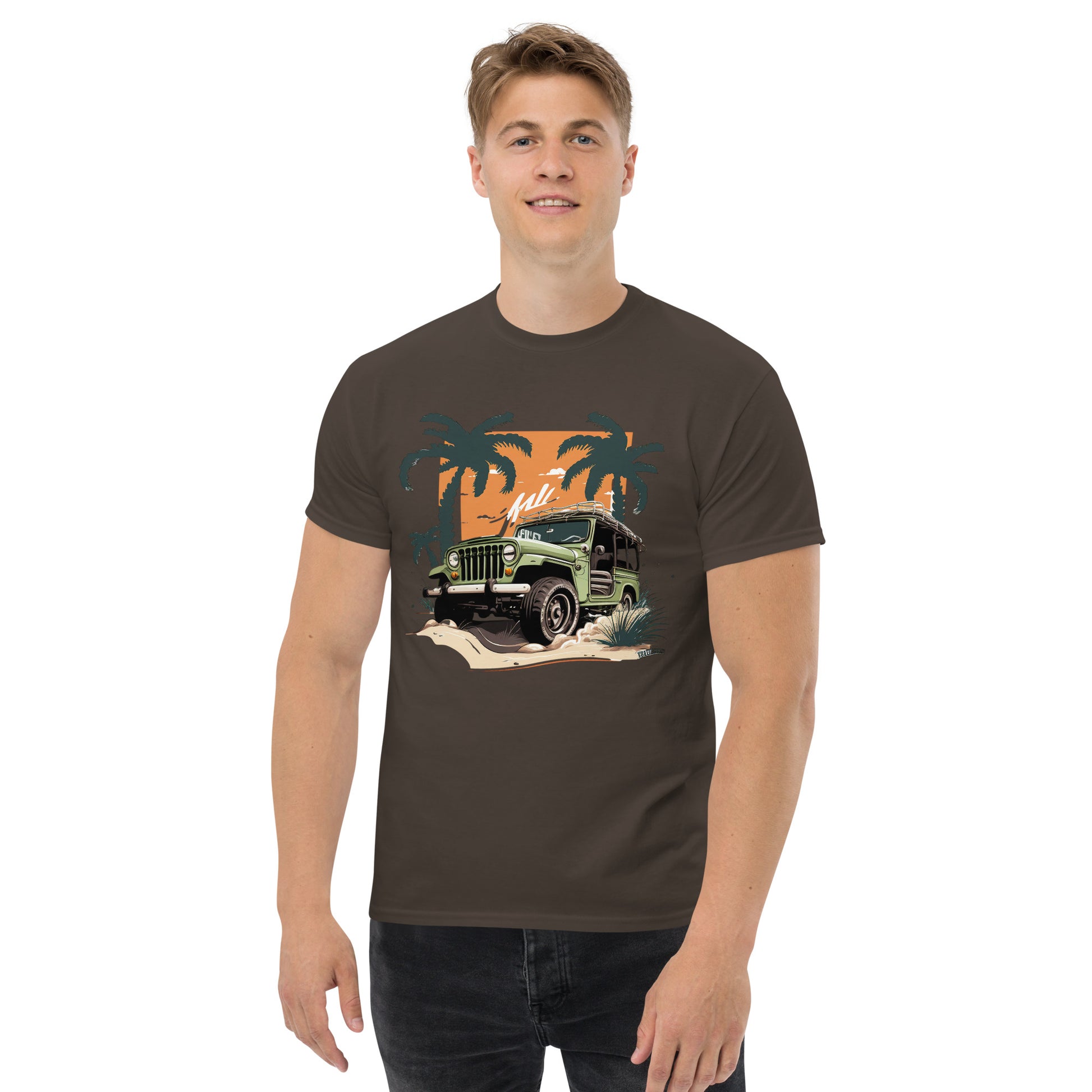 man with brown t-shirt with picture of jeep in front of palm trees 