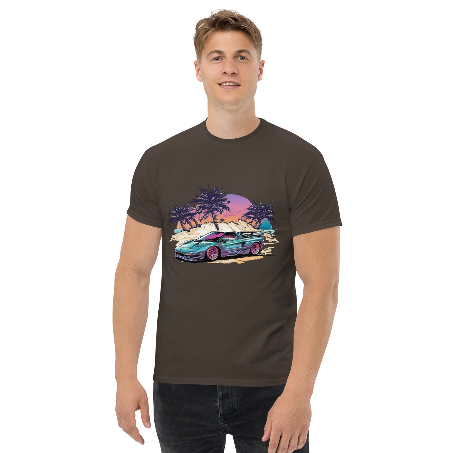 man with brown t-shirt with picture of vintage car in front of palm trees