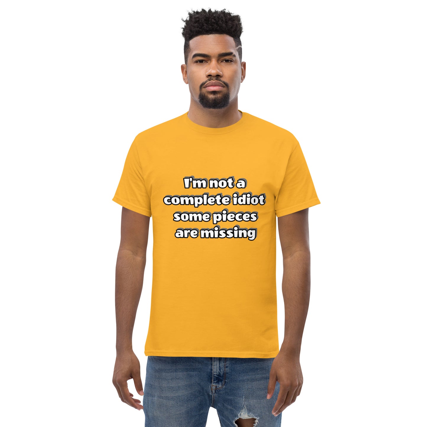 Men with yellow t-shirt with text “I’m not a complete idiot, some pieces are missing”