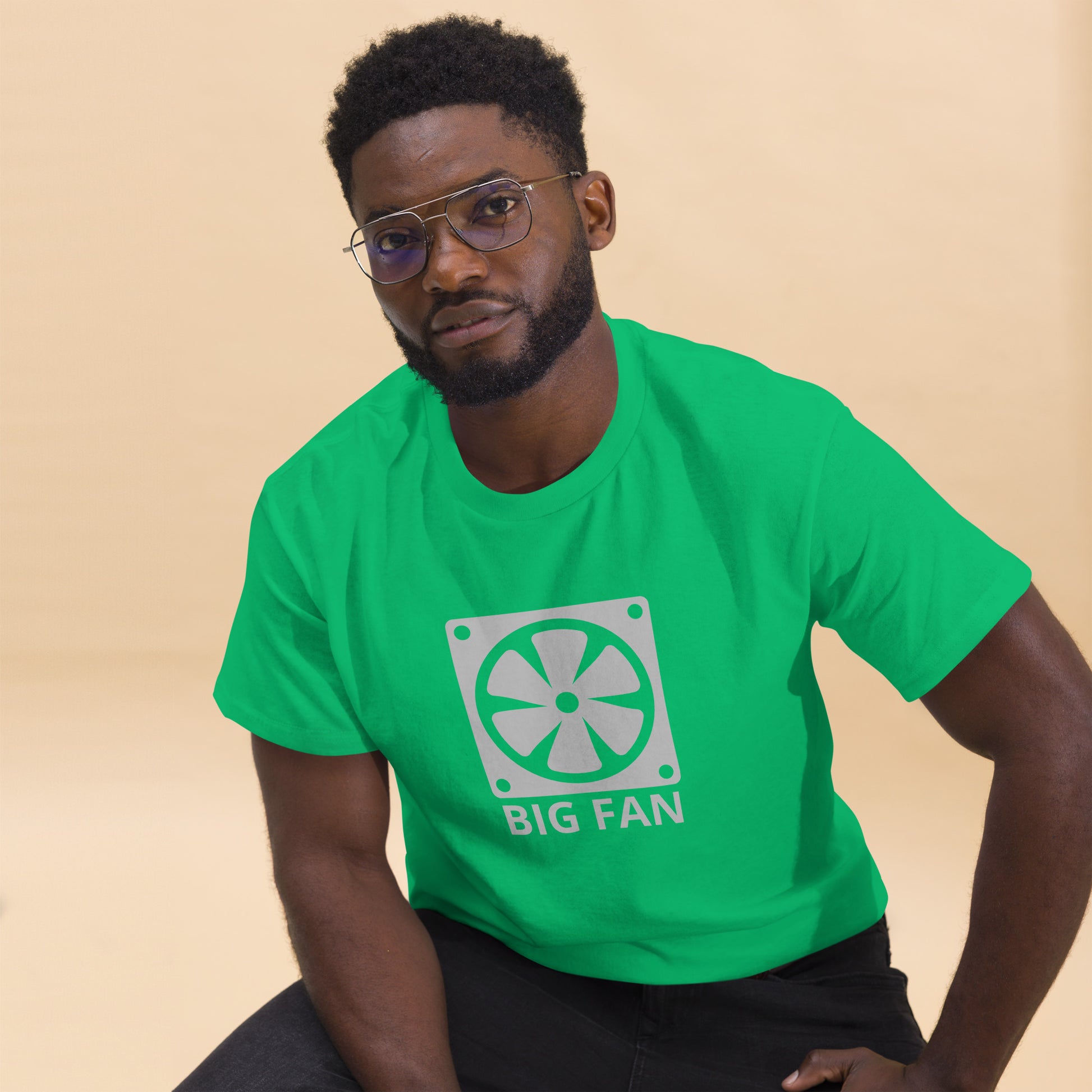 Man with Irish green t-shirt with image of a big computer fan and the text "BIG FAN"