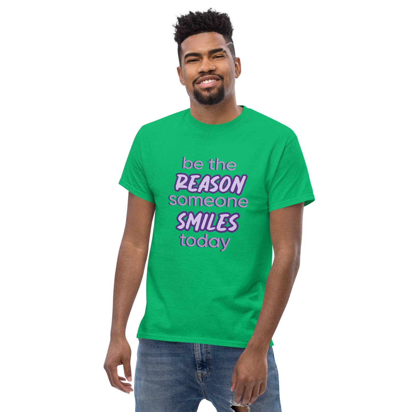 Men with irish green T-shirt and the quote "be the reason someone smiles today" in purple on it. 