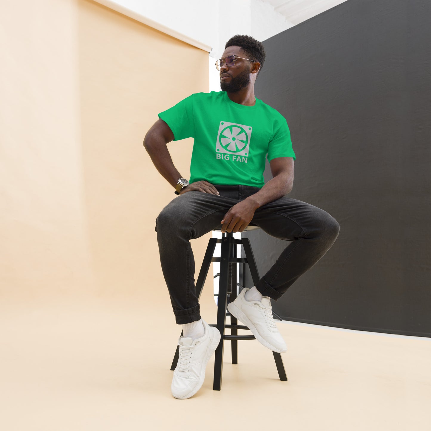 Man with Irish green t-shirt with image of a big computer fan and the text "BIG FAN"