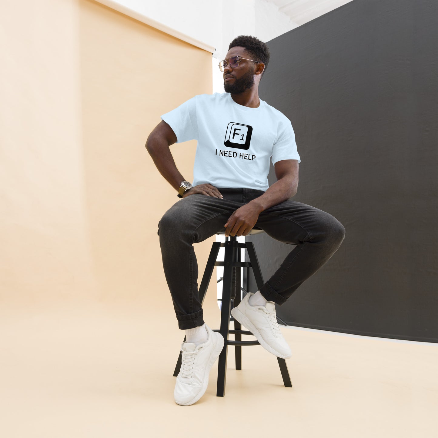Men with Light blue T-shirt and a picture of F1 key with text "I need help"