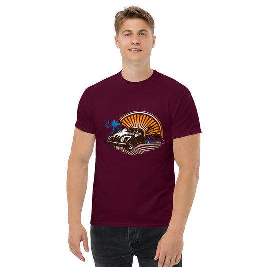 Men with maroon t-shirt with sunset and beetle car